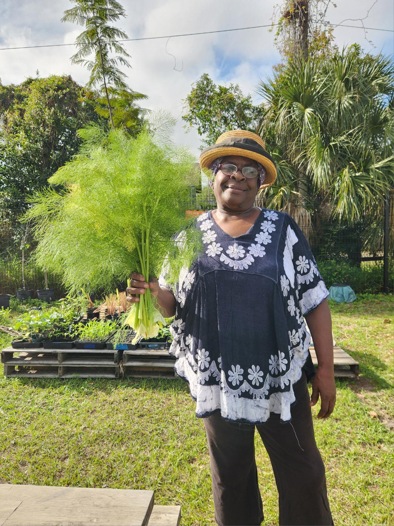 Woman with fresh green produce