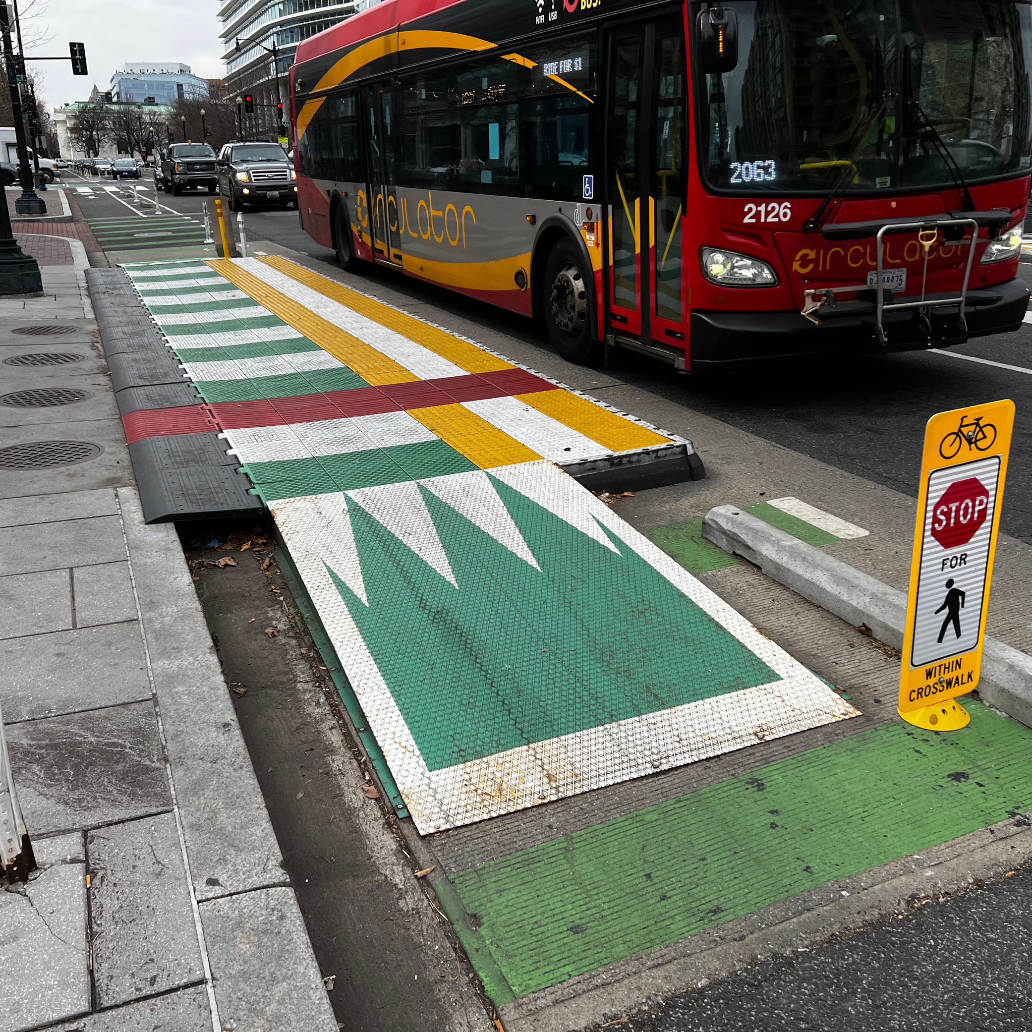 A photo of a modular bus boarding platform.