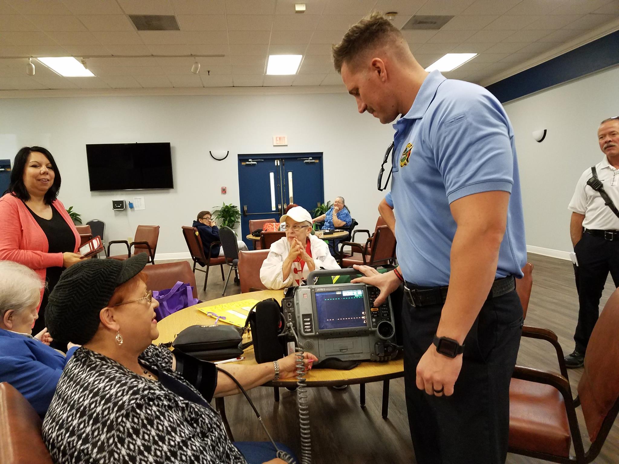 OFD firefighter provides blood pressure checks