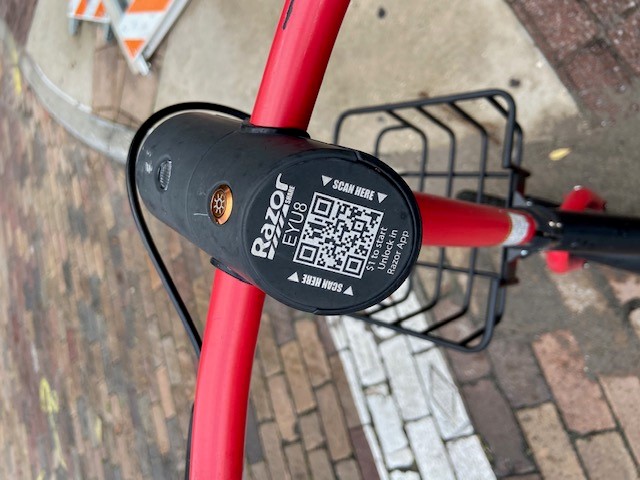 Closeup of the QR code located between the handlebars on a Razor