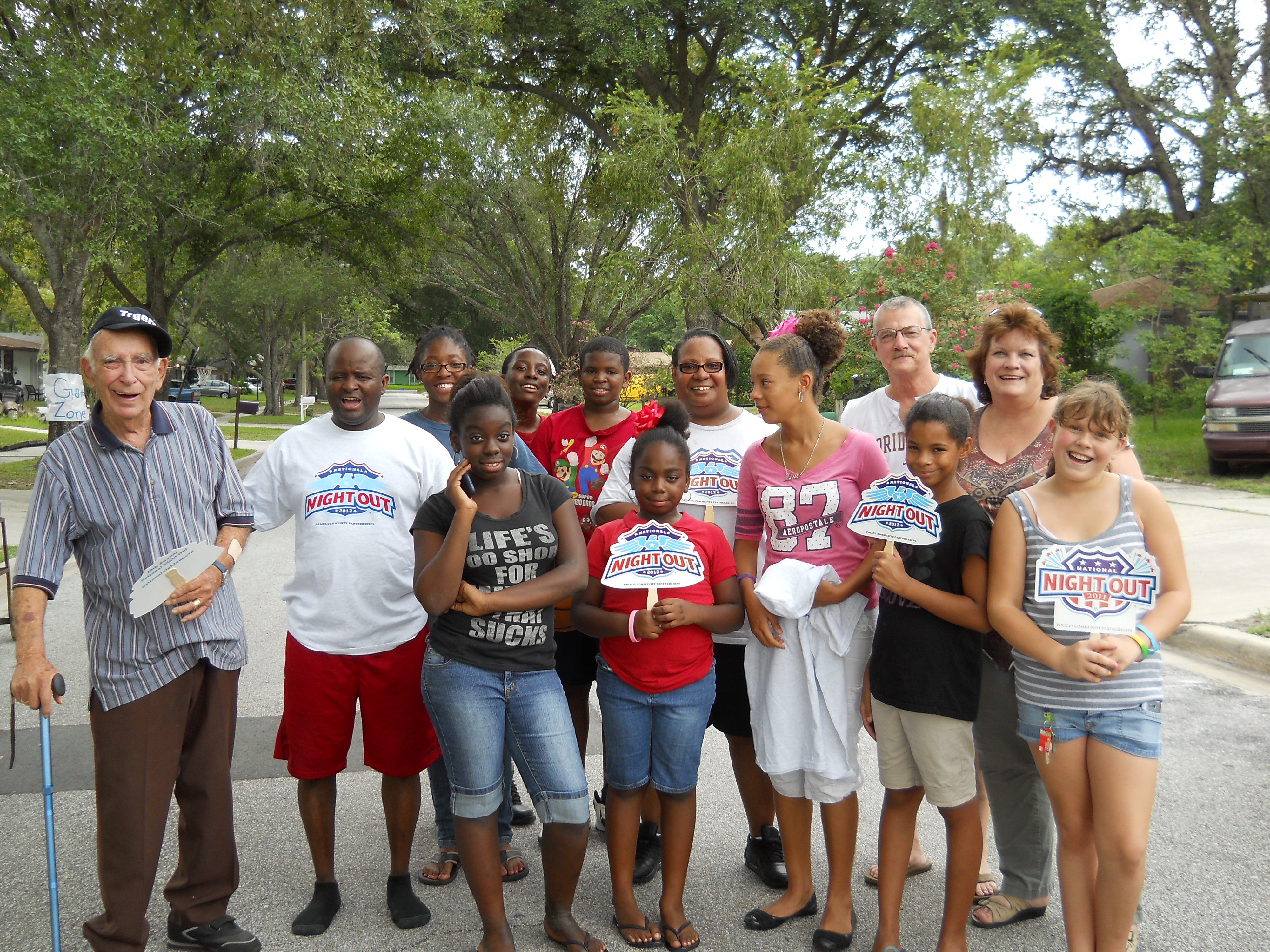 Group of community members pose for a photo together 