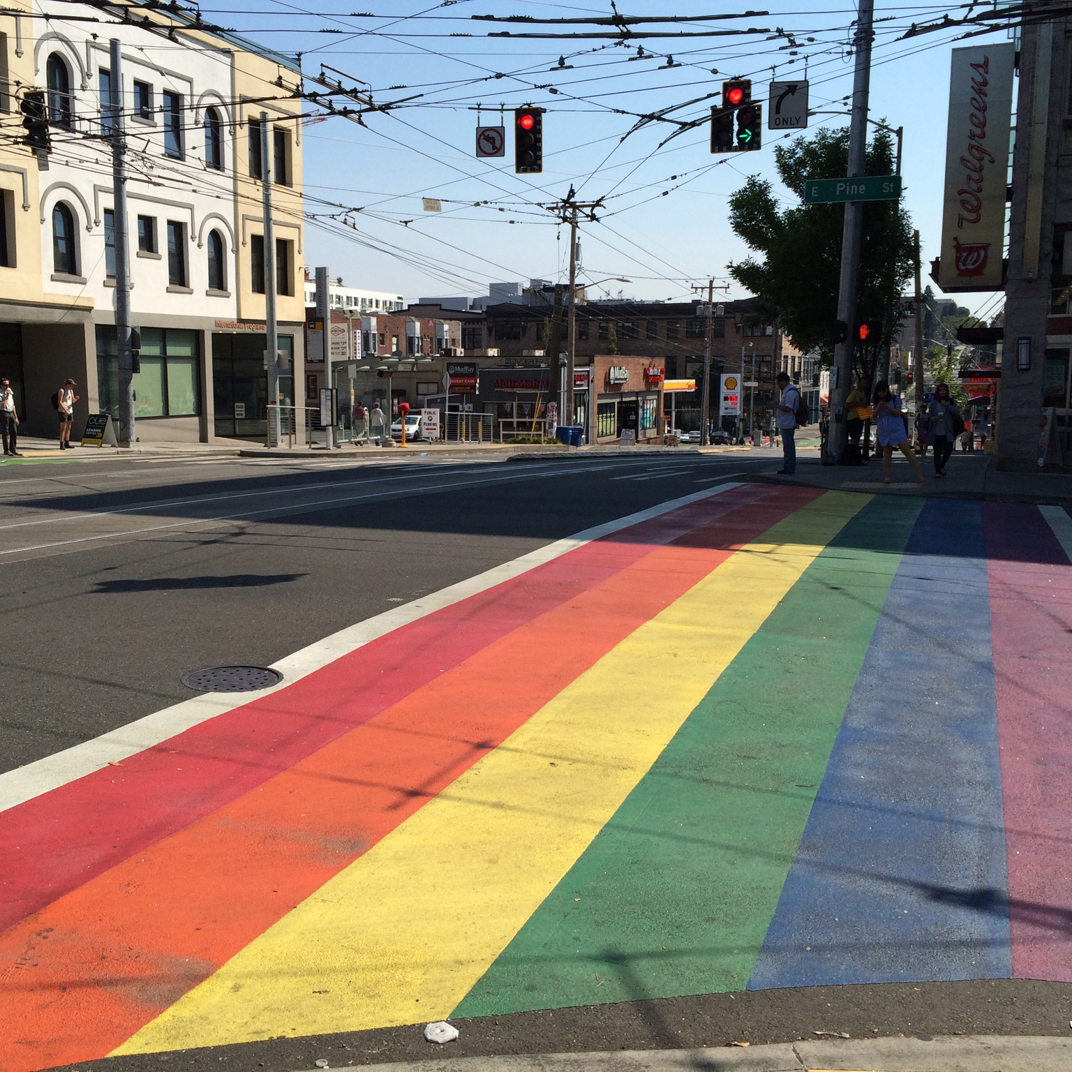  A photograph of a rainbow crosswalk painted with Durable Liquid Pavement Markings.