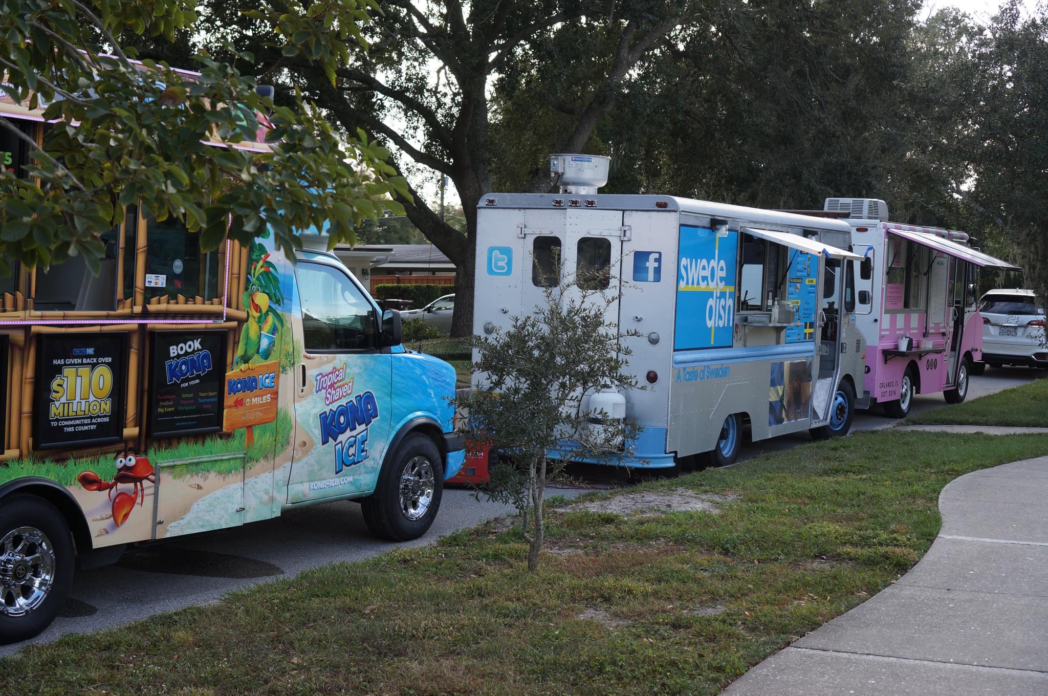 food trucks by sidewalk